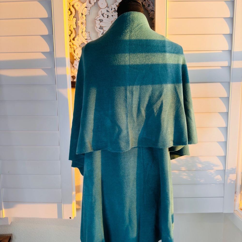 Poncho wrap high low.
